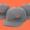 Три серые бейсболки ROAST WAVE в динамичной раскладке — виден оранжевый логотип на боковой панели