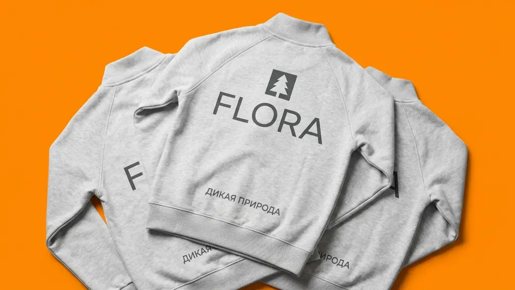 Три серые толстовки FLORA внахлест, крупный логотип на спинке, оранжевый фон