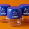 Три ланч-бокса EcoBite с синими крышками и прозрачными чашами на оранжевом фоне