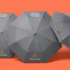 Три складных зонта FIELD FLOW в динамичной композиции — брендированные клинья купола под углом три четверти