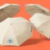 Складные зонты SkyGuard Solutions с логотипом на коралловом фоне, три ракурса