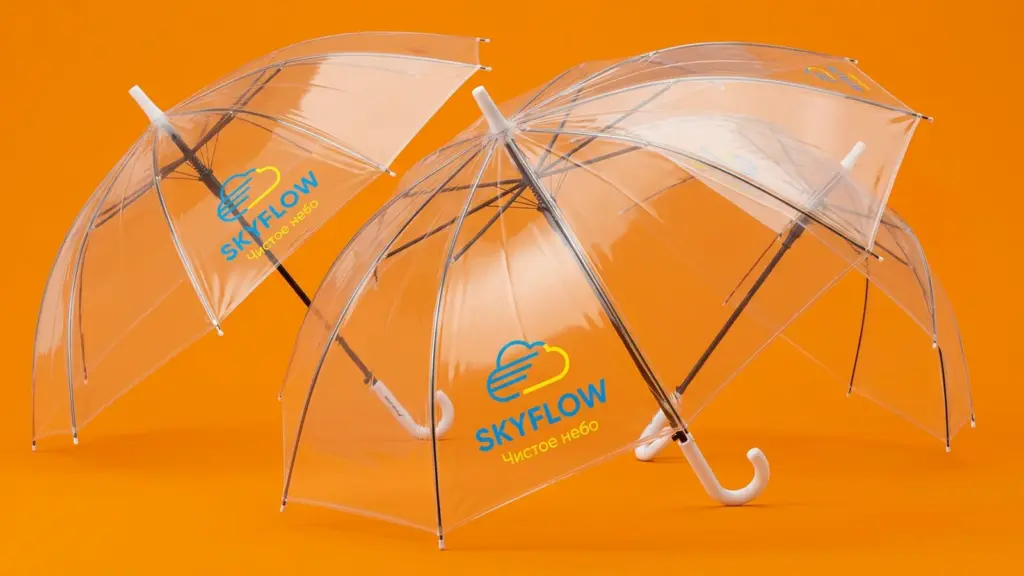 Три прозрачных зонта-трости SKYFLOW в ракурсе три четверти на оранжевом фоне — игра слоёв и отражений